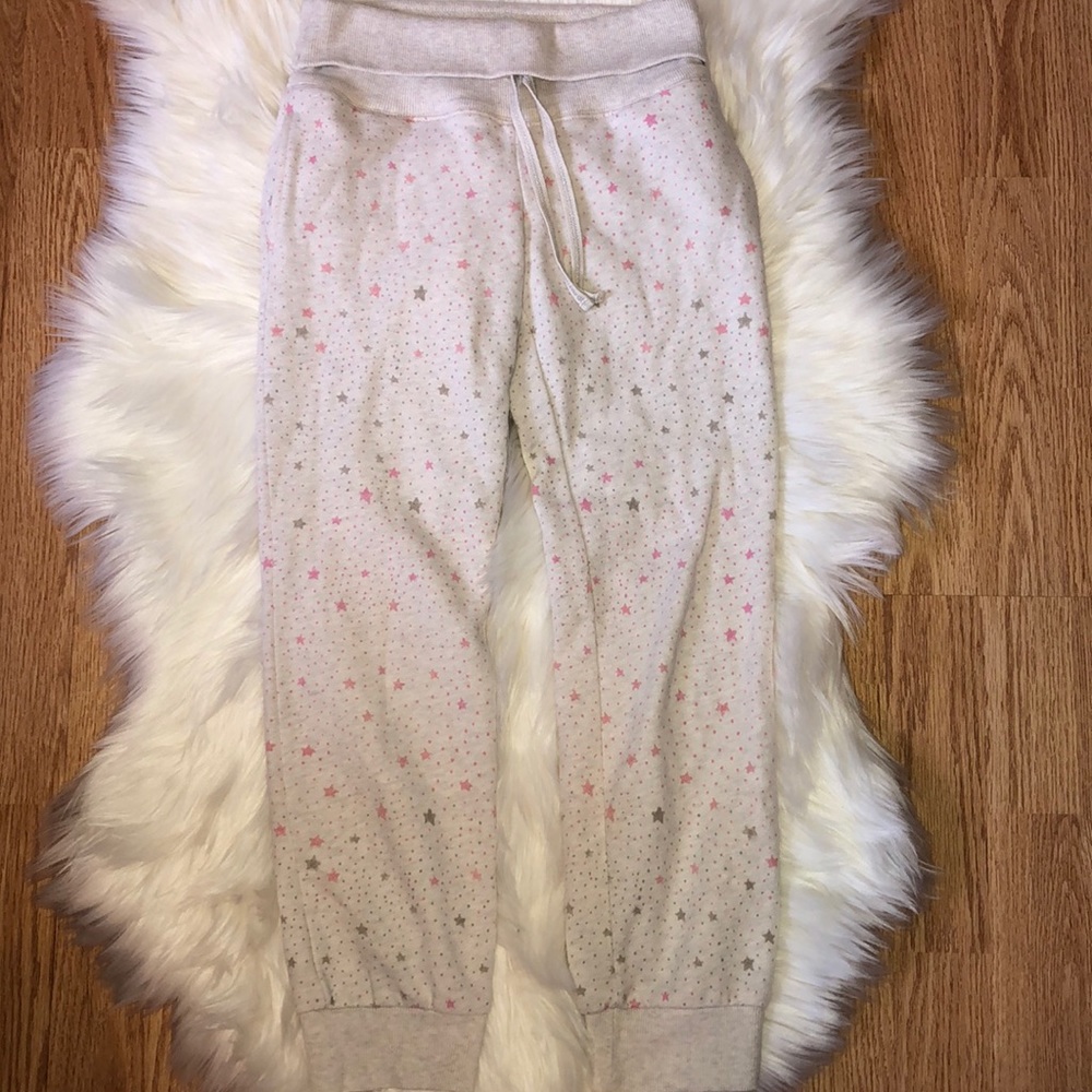 White sweatpants with star designs